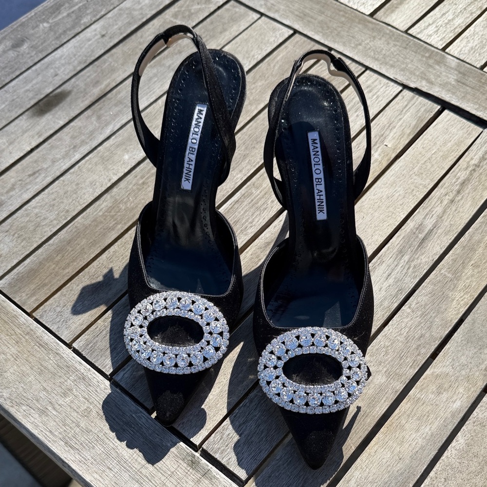 Stunning Manalo satin and rhinestone sling back kitten heels.